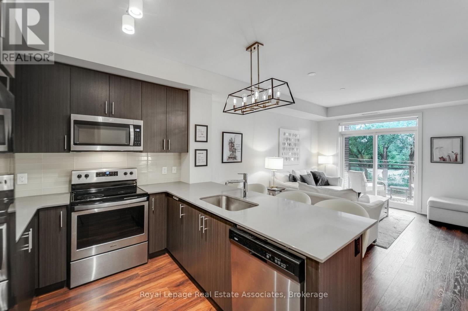 Photo 9 of 409 320 Plains Road E, Burlington ON