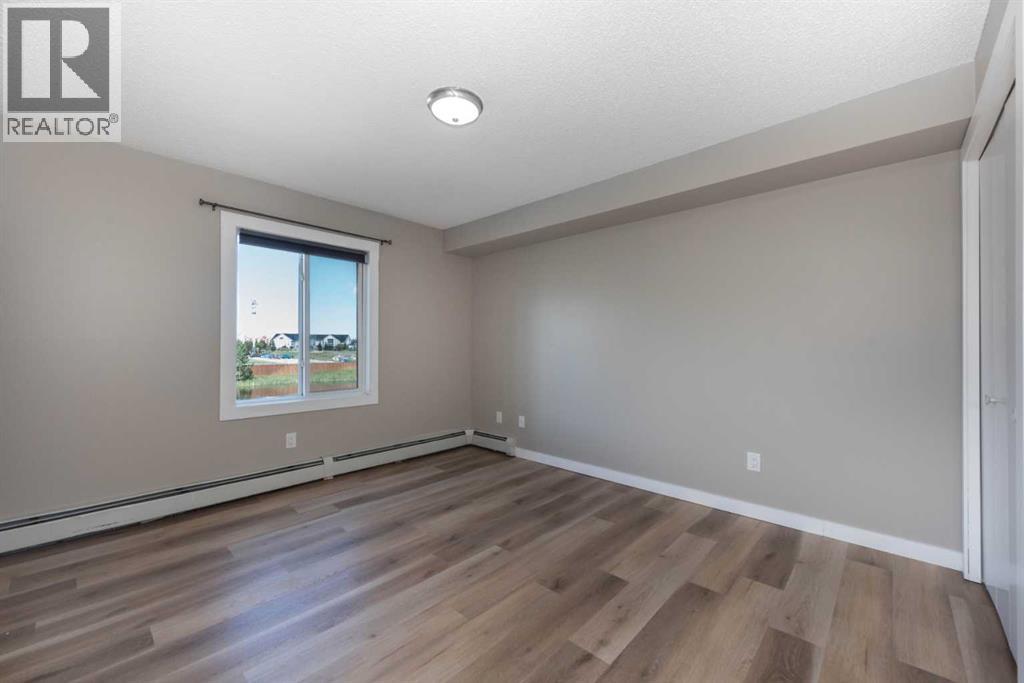 Photo 21 of 6204 304 Mackenzie Way Sw, Airdrie AB