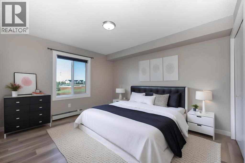Photo 6 of 6204 304 Mackenzie Way Sw, Airdrie AB