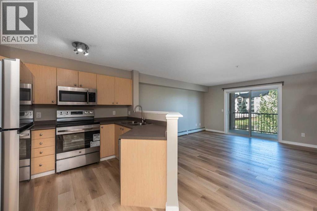 Photo 8 of 6204 304 Mackenzie Way Sw, Airdrie AB