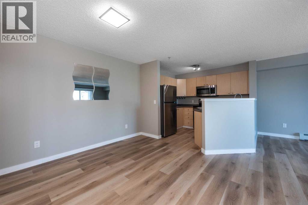 Photo 11 of 6204 304 Mackenzie Way Sw, Airdrie AB