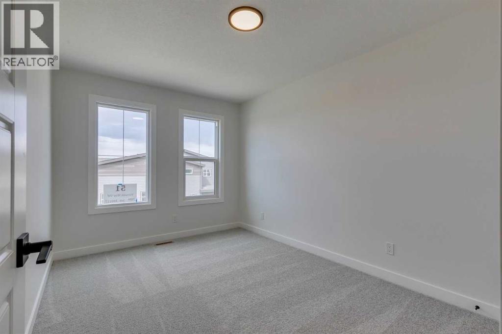 Photo 27 of 51 Versant Way Sw, Calgary AB
