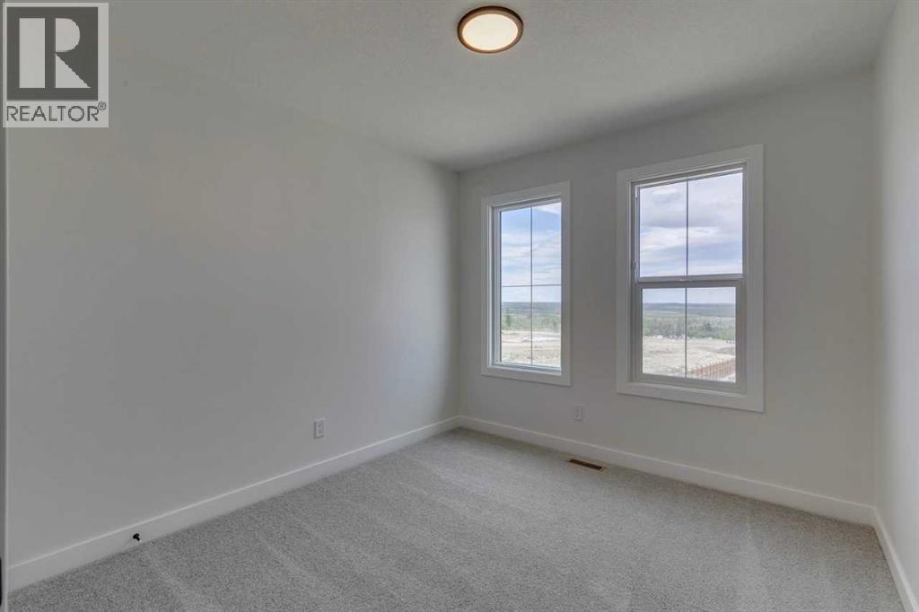 Photo 29 of 51 Versant Way Sw, Calgary AB