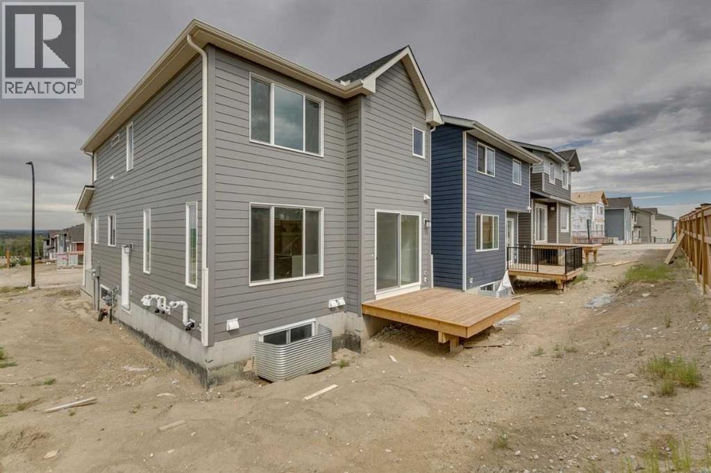 Photo 3 of 51 Versant Way Sw, Calgary AB