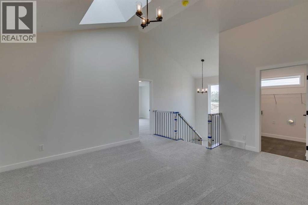 Photo 24 of 51 Versant Way Sw, Calgary AB