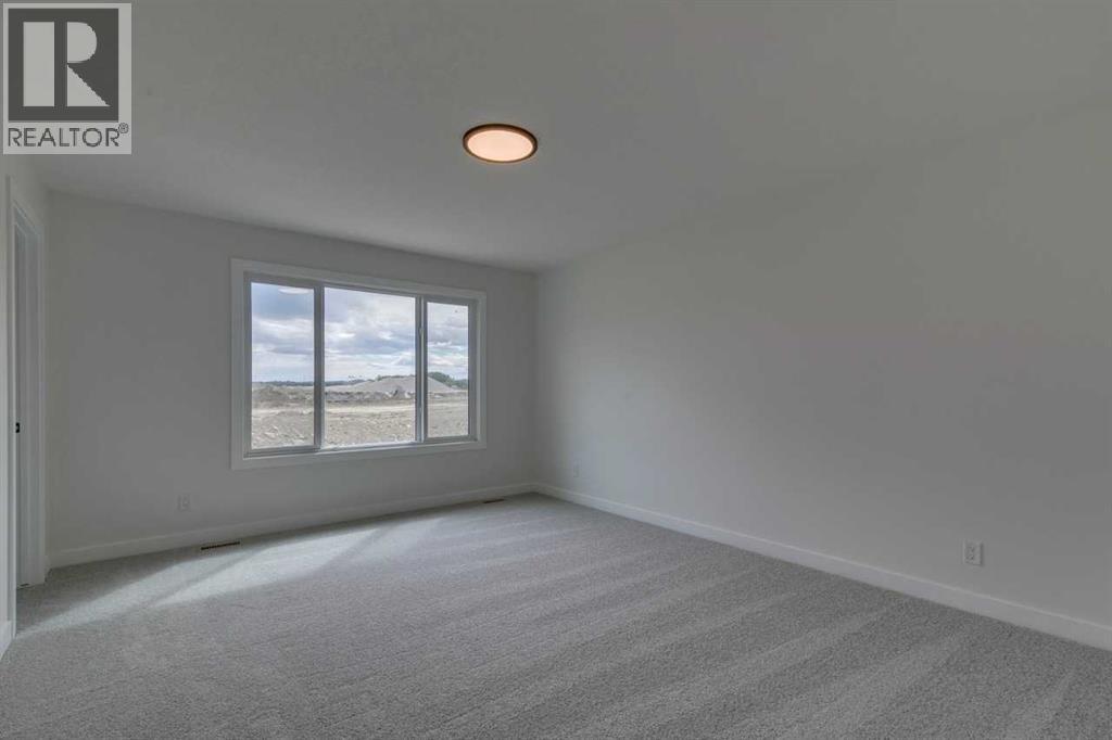 Photo 31 of 51 Versant Way Sw, Calgary AB