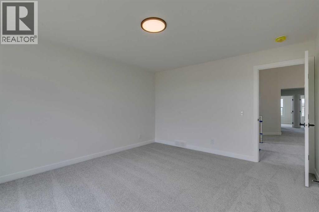 Photo 32 of 51 Versant Way Sw, Calgary AB