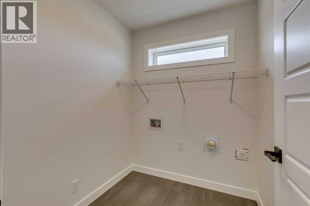 Photo 21 of 51 Versant Way Sw, Calgary AB