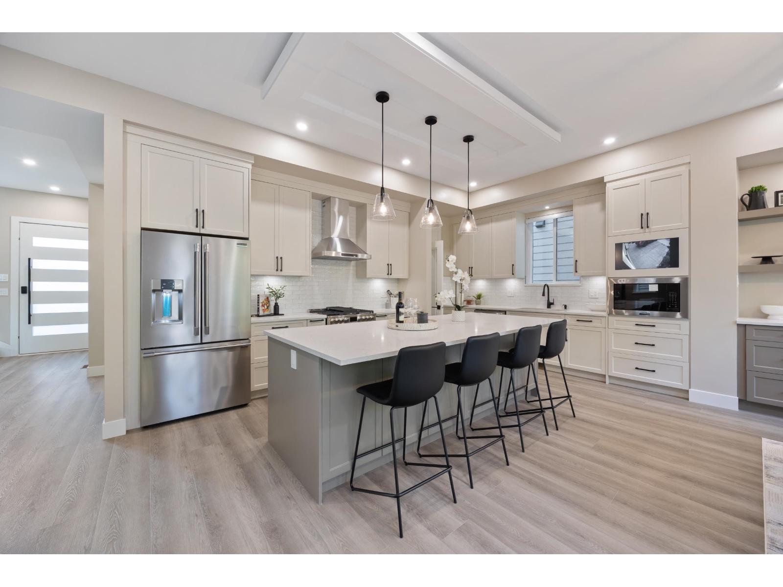 Photo 5 of 7024 205 Street, Langley BC