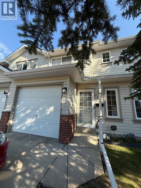 Photo 1 of 12 Millrise Green Sw, Calgary AB