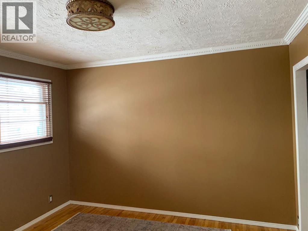 Single Family House Bungalow for Sale in  Bow Crescent NW Bowness Calgary 