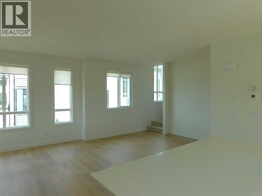 Photo 9 of 233 857 Belmont Drive Sw, Calgary AB