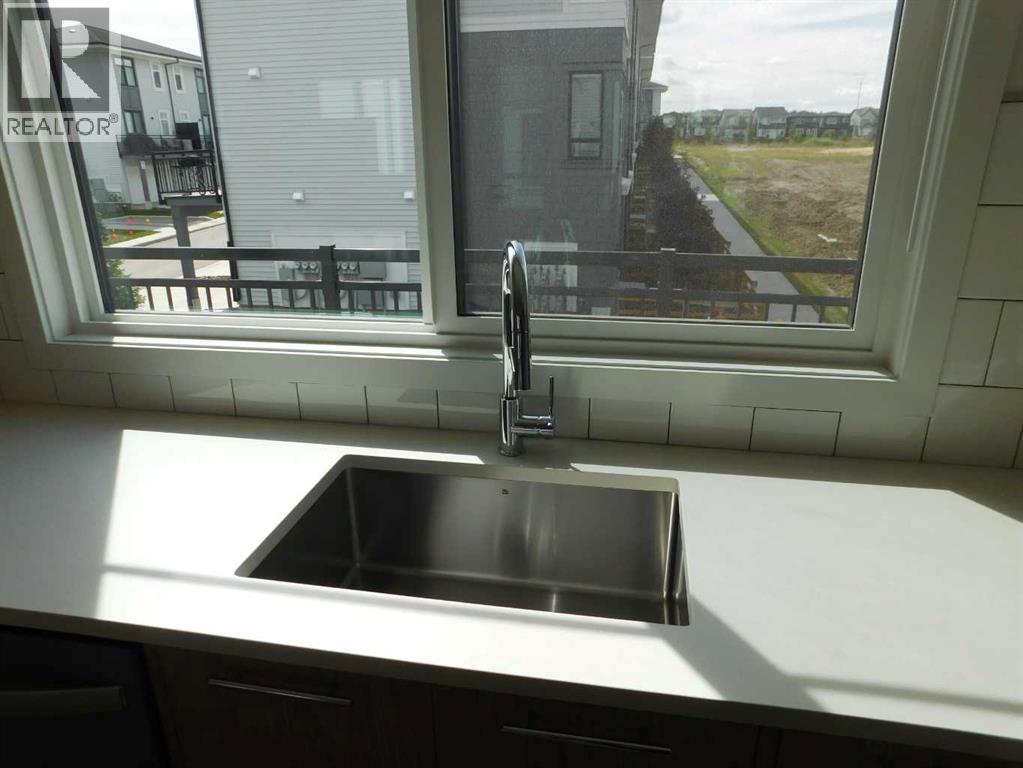 Photo 10 of 233 857 Belmont Drive Sw, Calgary AB