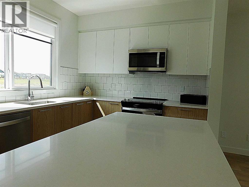 Photo 14 of 233 857 Belmont Drive Sw, Calgary AB