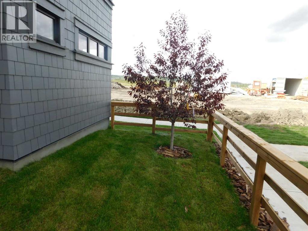 Photo 5 of 233 857 Belmont Drive Sw, Calgary AB