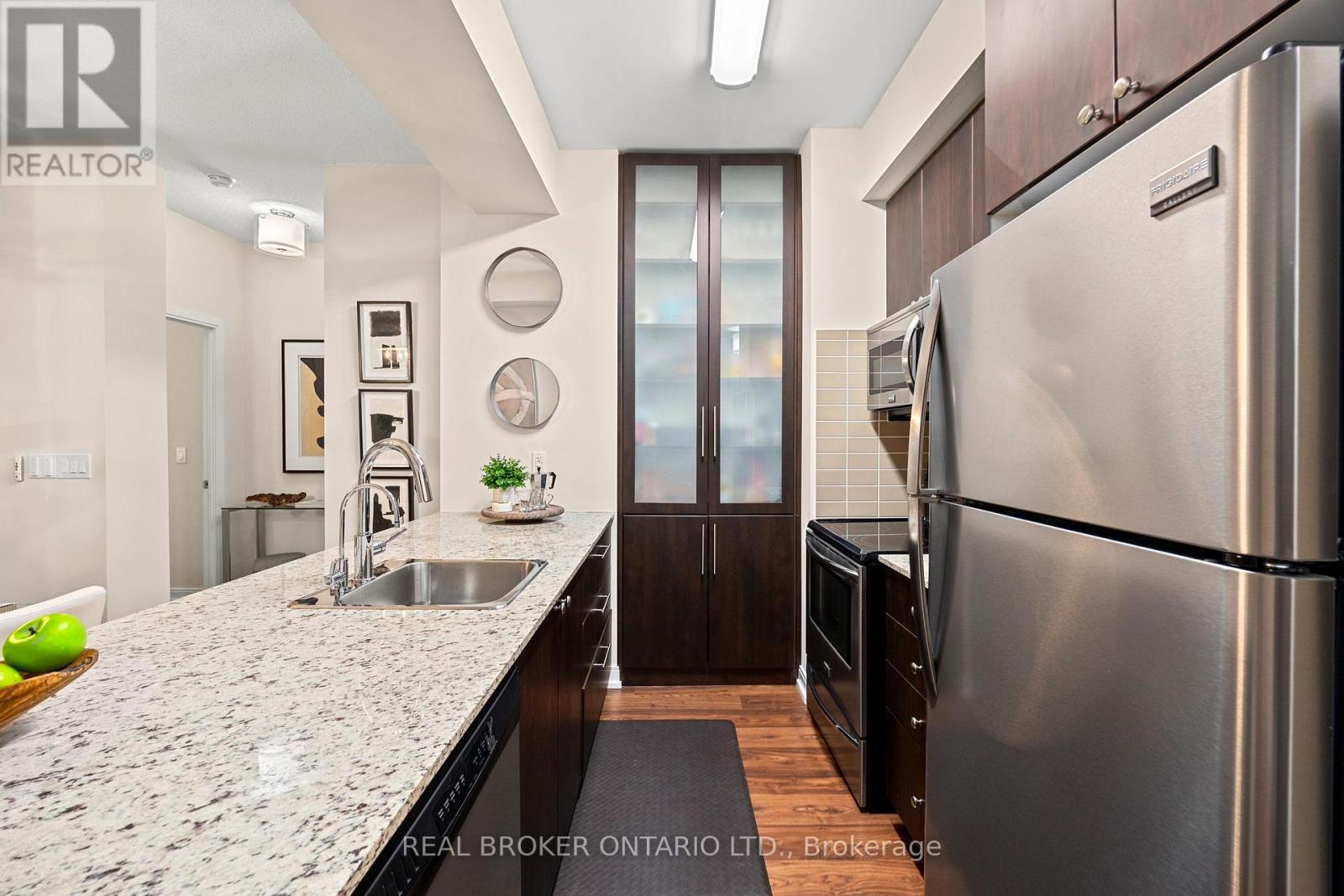Photo 7 of 119 181 Village Green Square, Toronto ON
