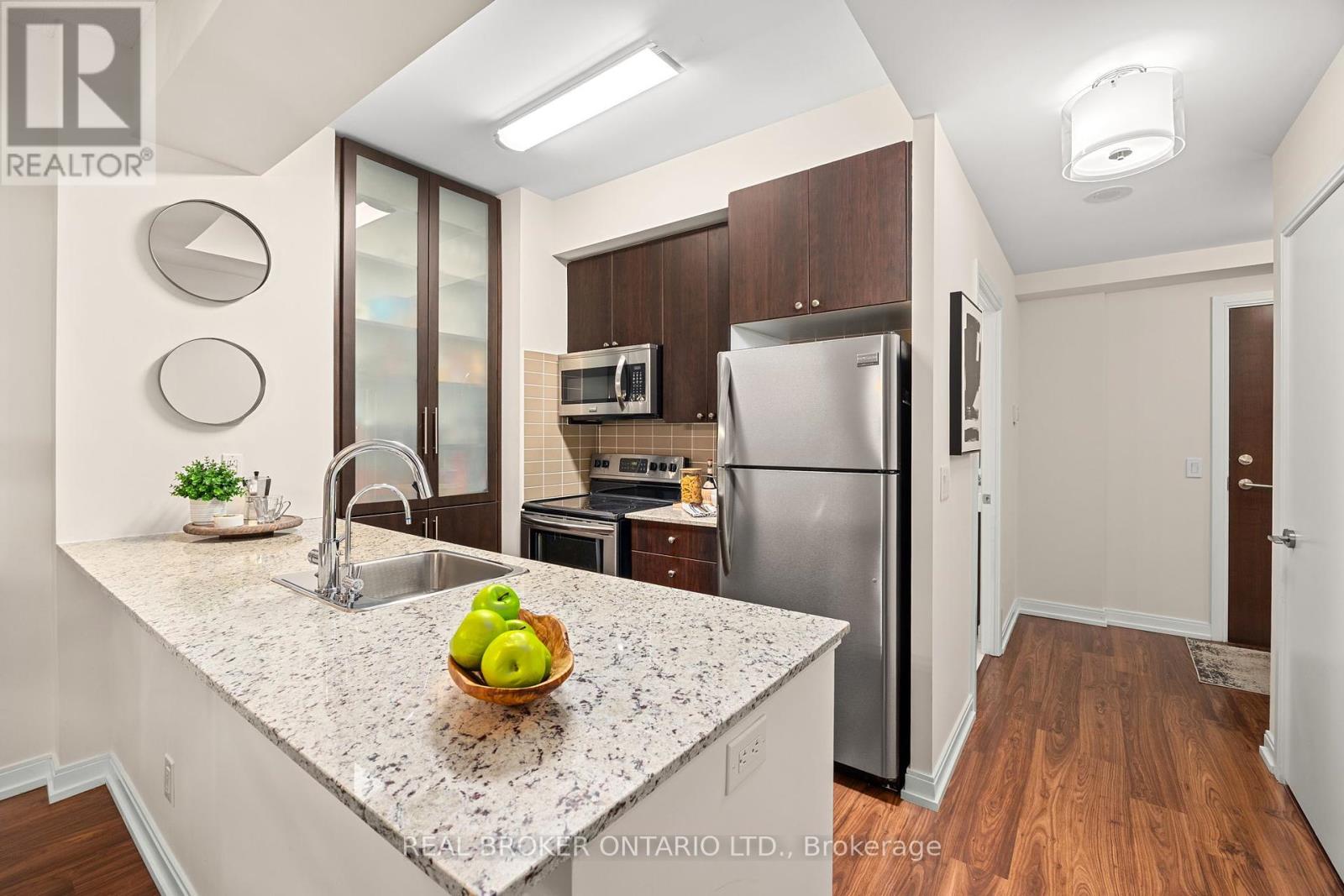 Photo 8 of 119 181 Village Green Square, Toronto ON