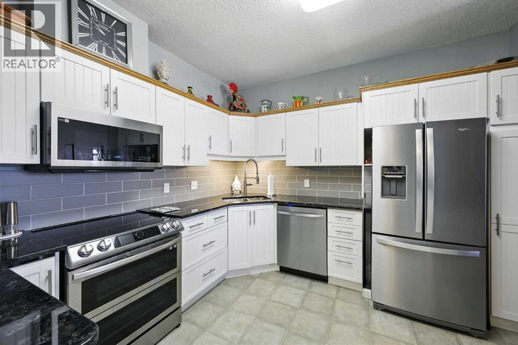 Photo 11 of 411 5201 Dalhousie Drive Nw, Calgary AB