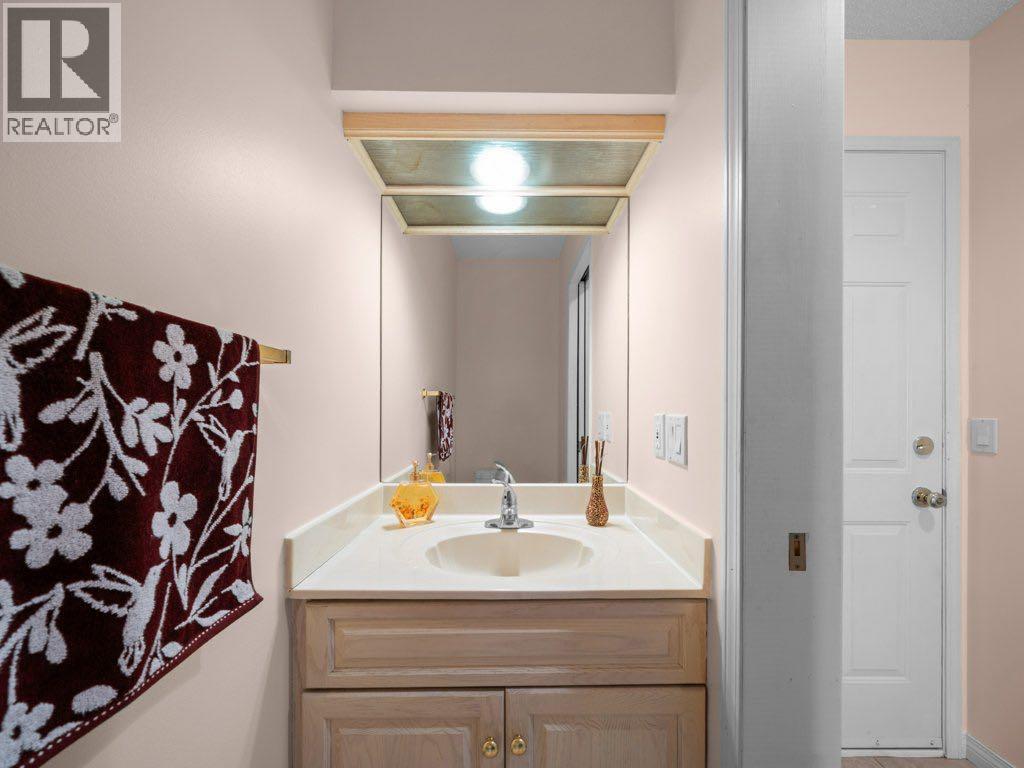 Photo 16 of 91 Woodbrook Road Sw, Calgary AB