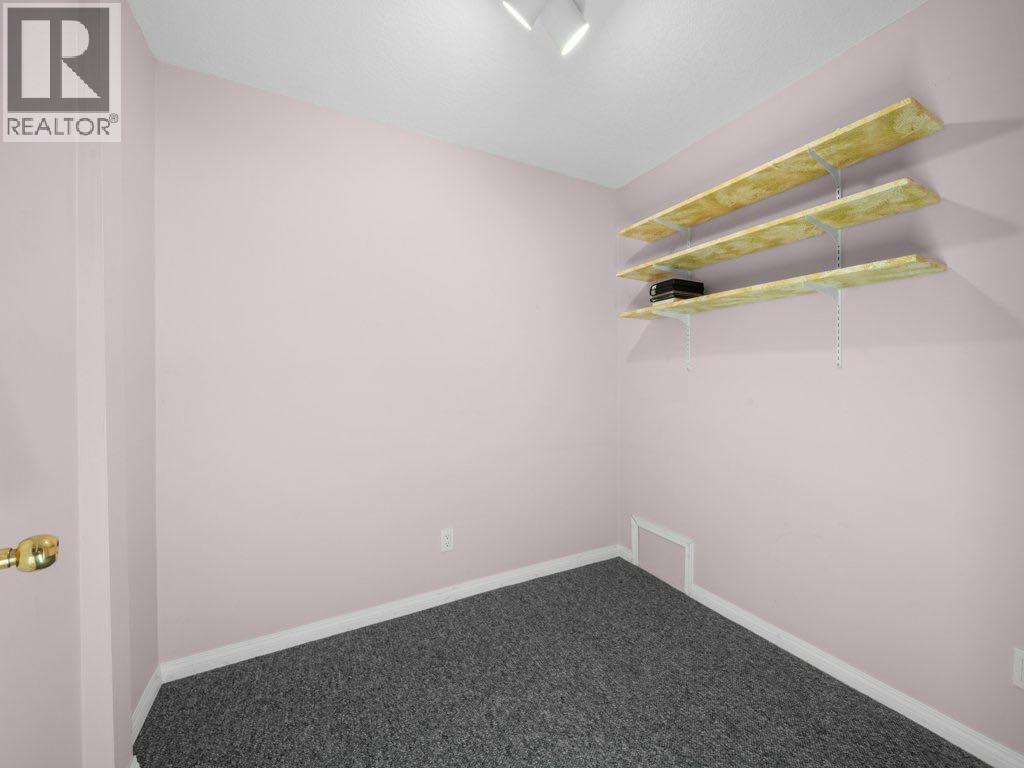 Photo 31 of 91 Woodbrook Road Sw, Calgary AB