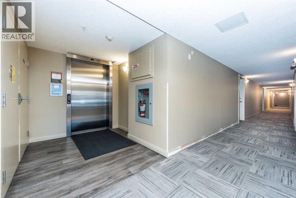 Photo 5 of 4210 403 Mackenzie Way Sw, Airdrie AB