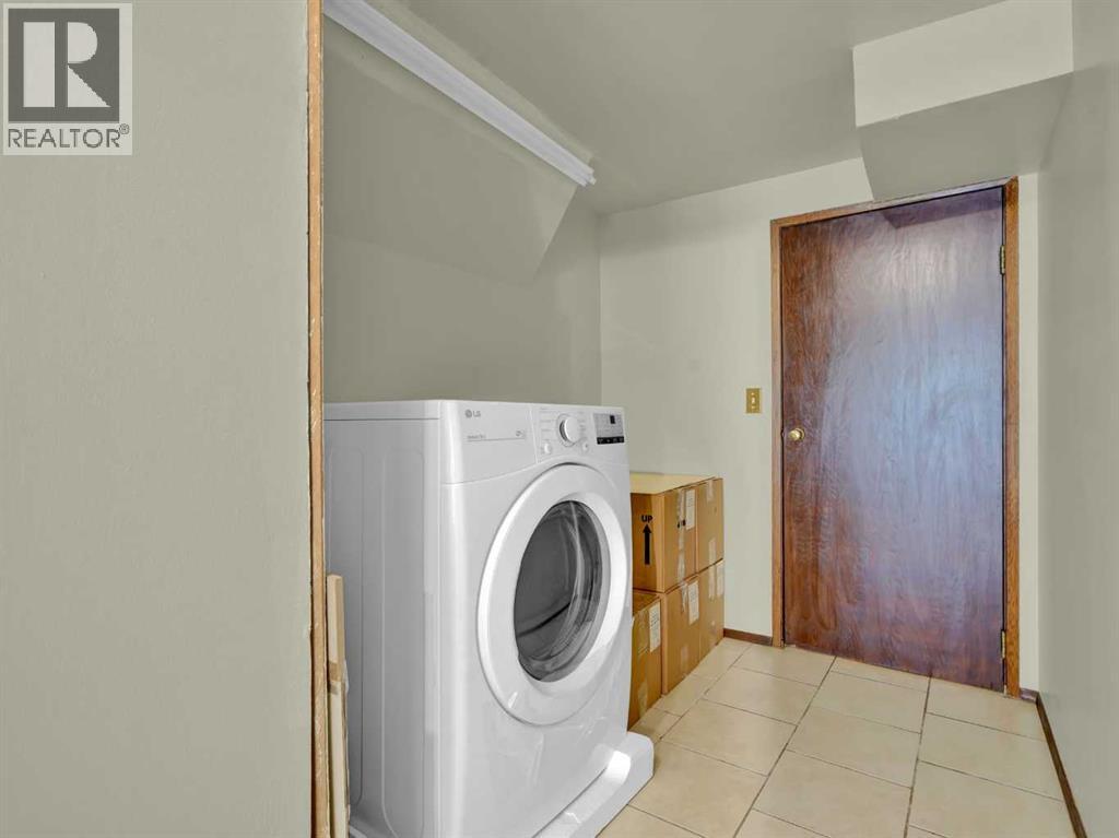 Photo 31 of 99 Hawkcliff Way Nw, Calgary AB