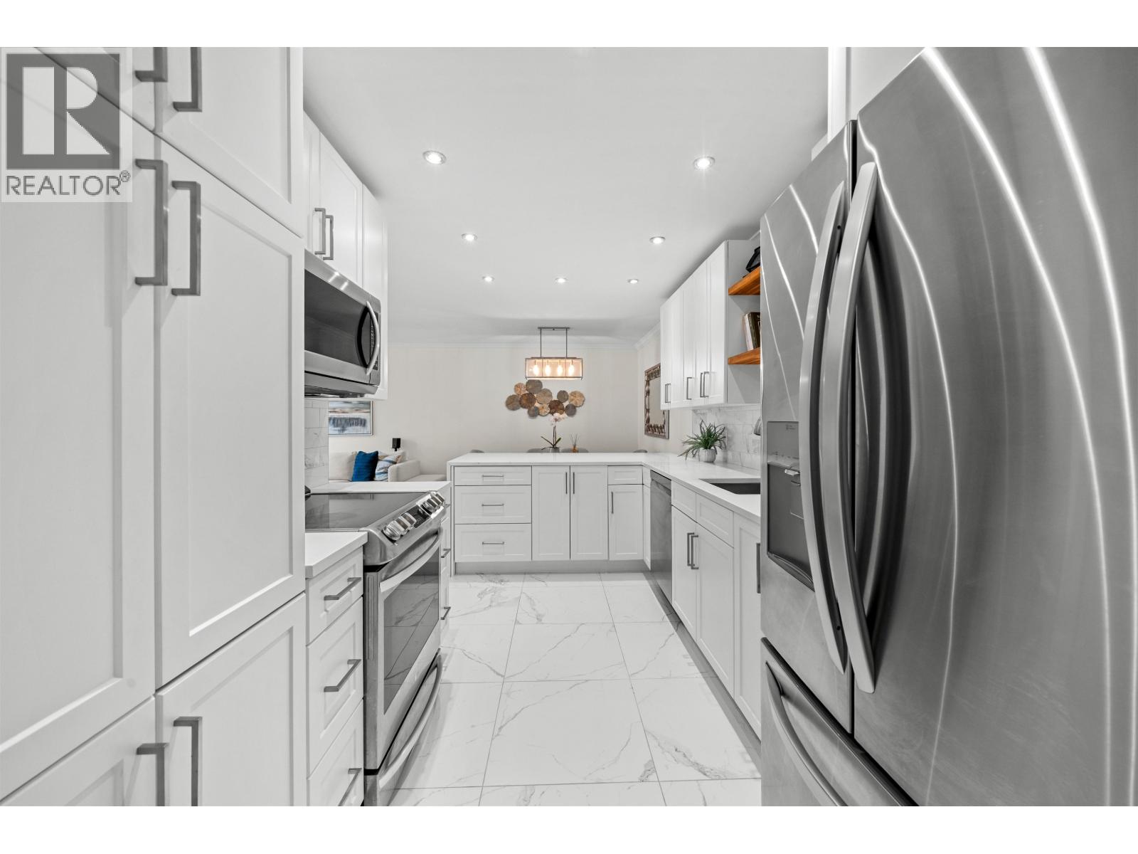 Photo 5 of T 4908 3980 Carrigan Court, Burnaby BC