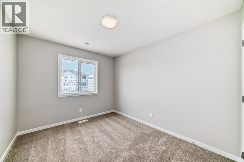 Photo 28 of 103 Magnolia Street Se, Calgary AB