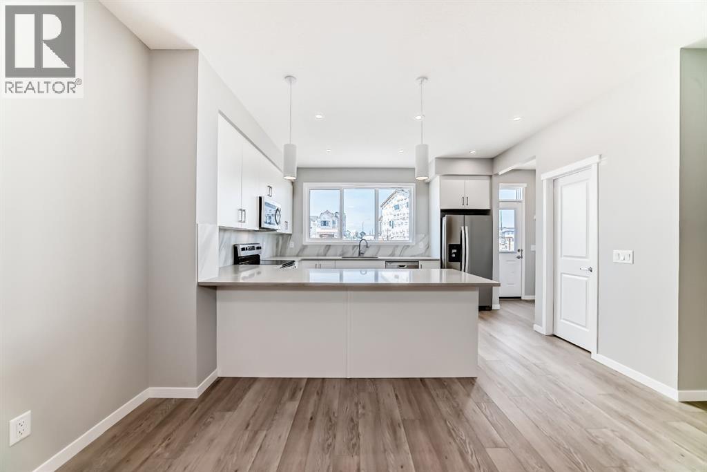 Photo 3 of 103 Magnolia Street Se, Calgary AB