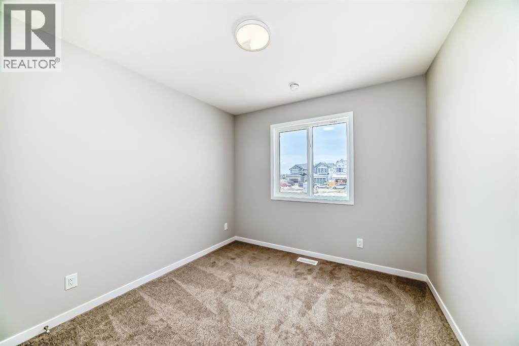 Photo 30 of 103 Magnolia Street Se, Calgary AB