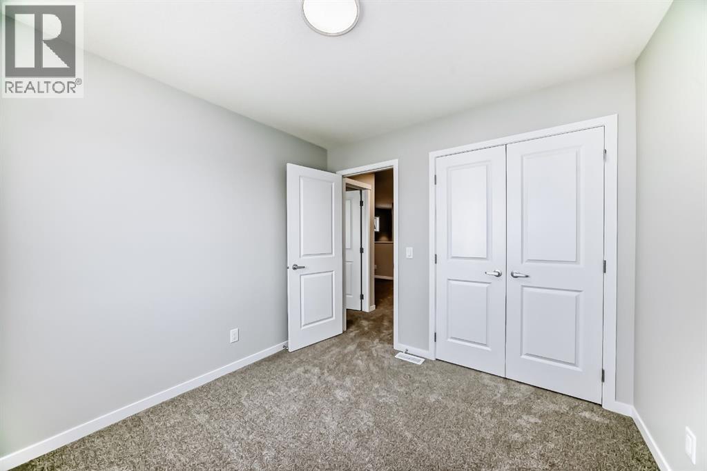 Photo 31 of 103 Magnolia Street Se, Calgary AB