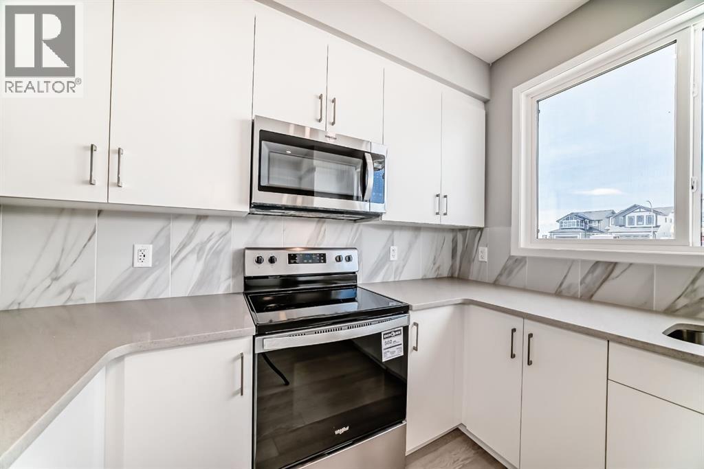 Photo 7 of 103 Magnolia Street Se, Calgary AB