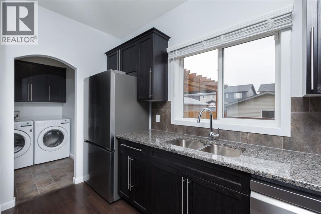 Photo 10 of 2461 Ravenswood View Se, Airdrie AB