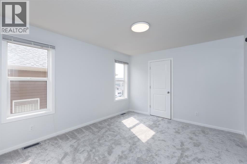 Photo 14 of 2461 Ravenswood View Se, Airdrie AB