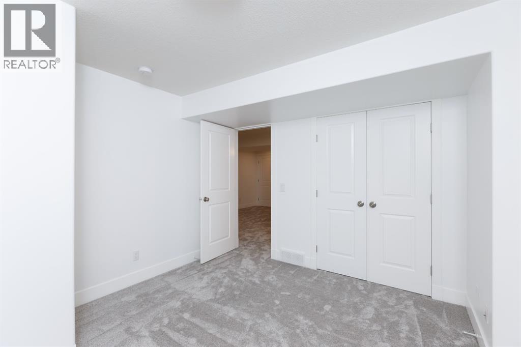 Photo 18 of 2461 Ravenswood View Se, Airdrie AB