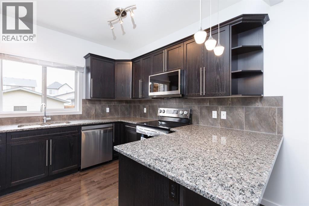 Photo 4 of 2461 Ravenswood View Se, Airdrie AB