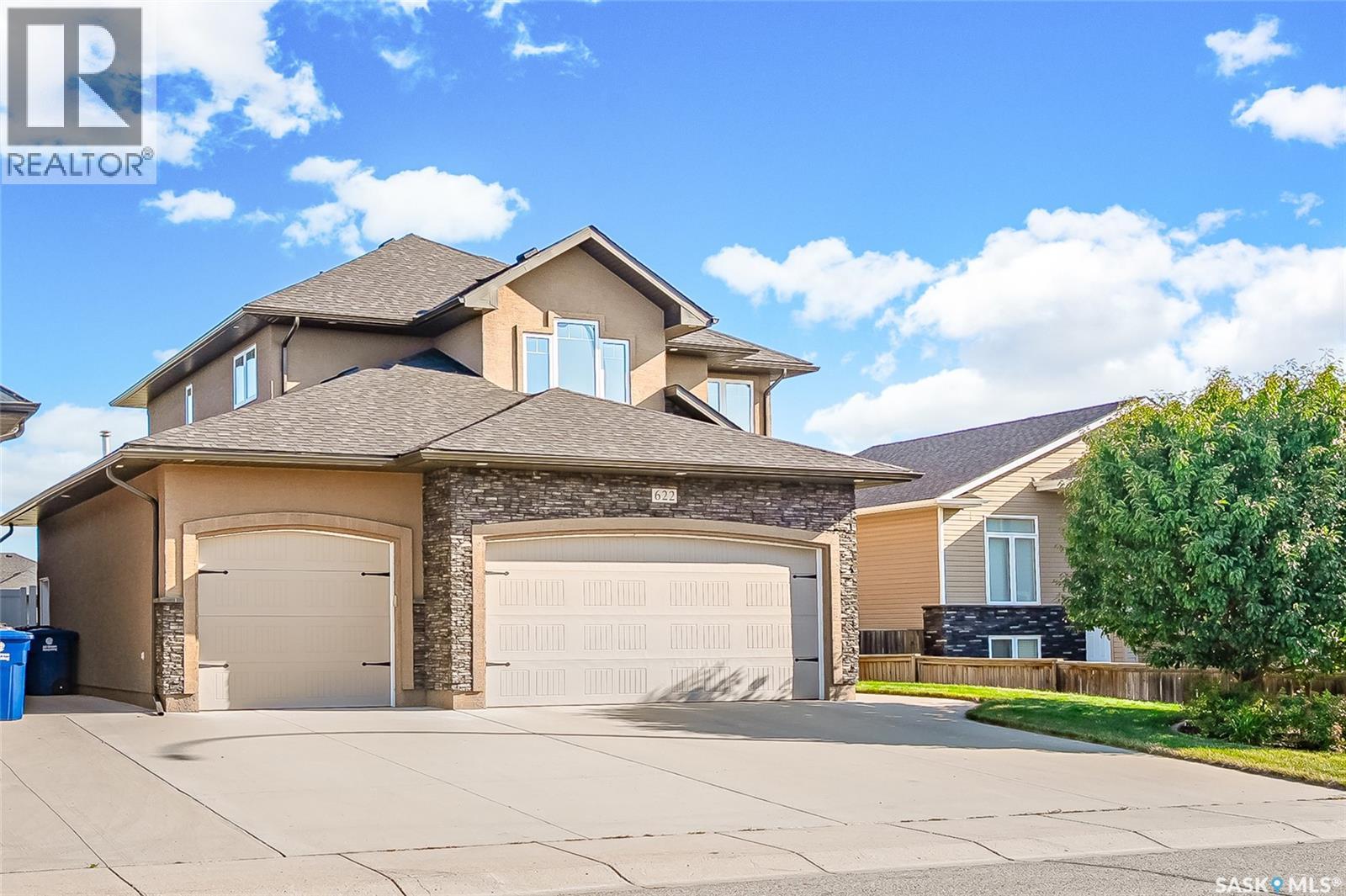 Photo 2 of 622 Thiessen Street, Warman SK