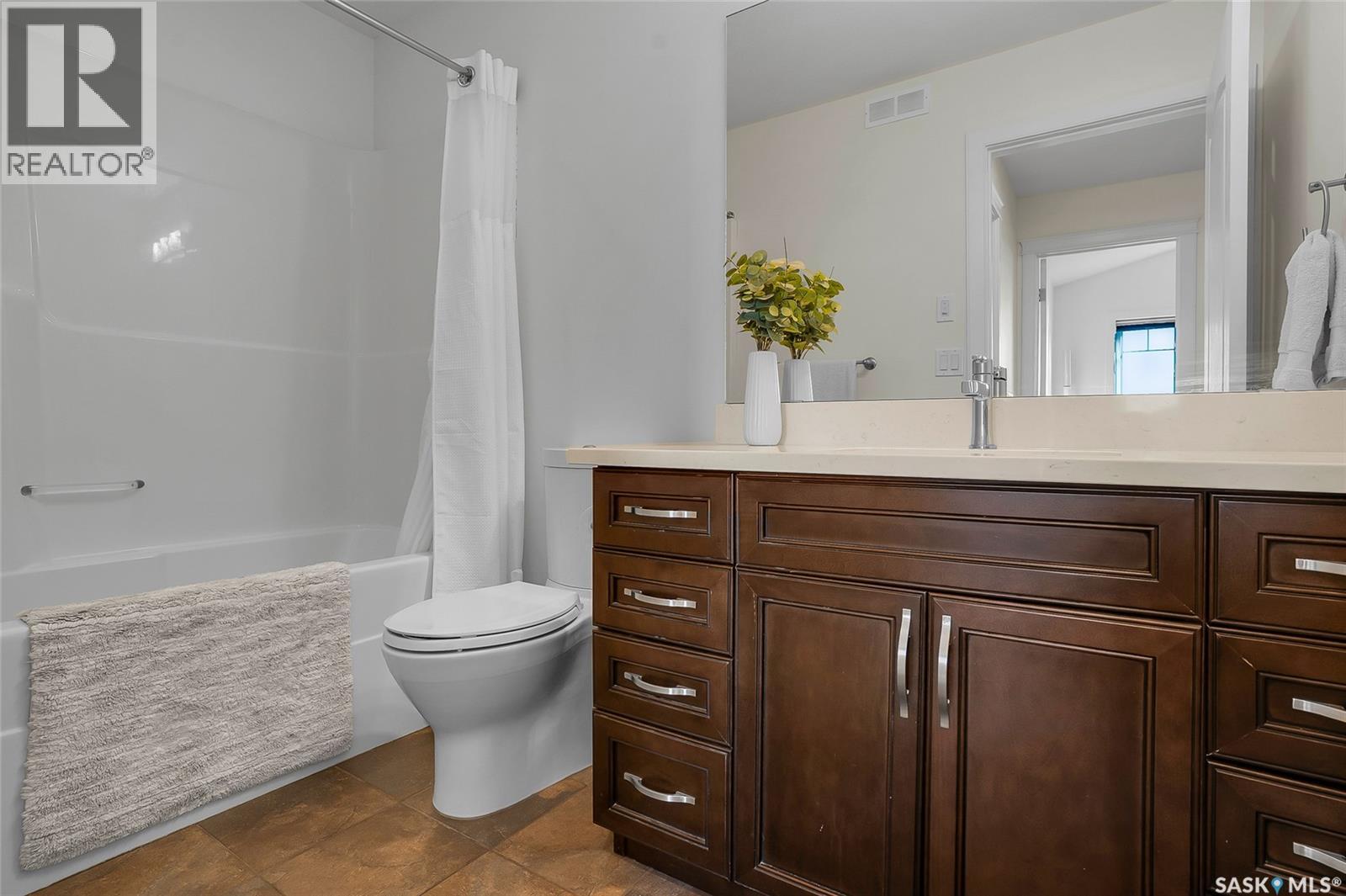 Photo 24 of 622 Thiessen Street, Warman SK