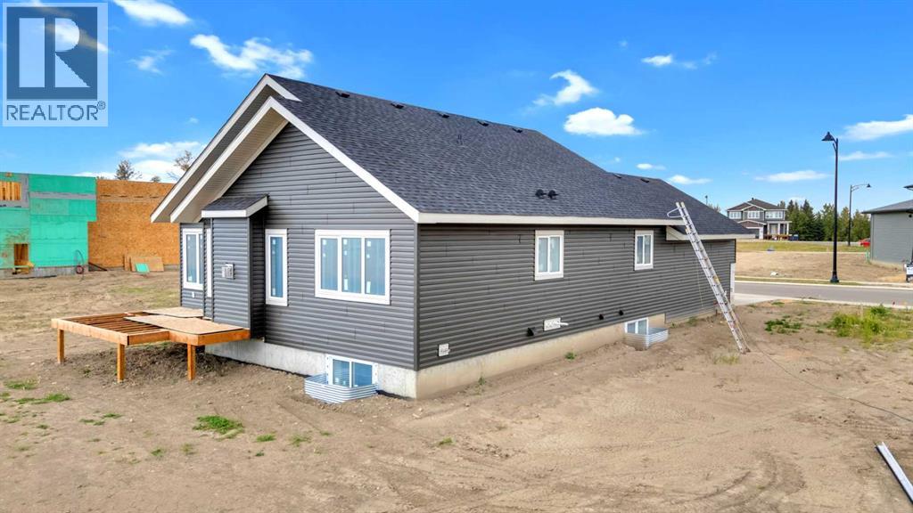 Single Family House Bungalow for Sale in  Everson Close Evergreen Red Deer 