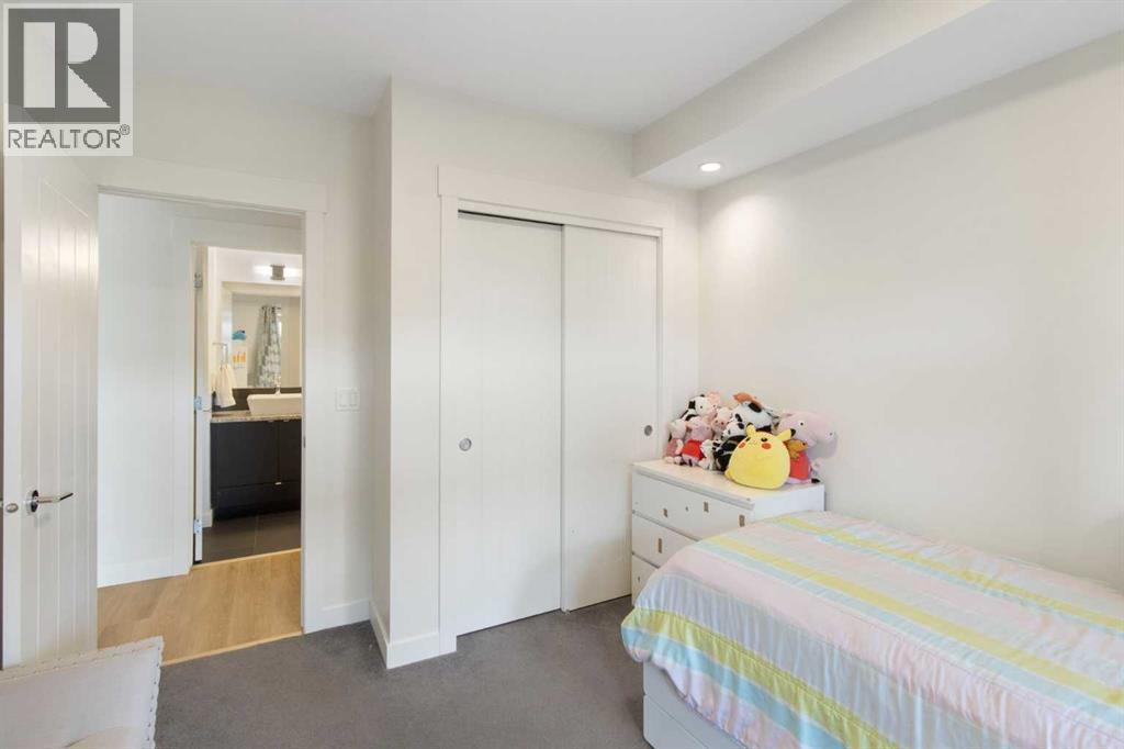 Photo 14 of 103 15 Aspenmont Heights Sw, Calgary AB