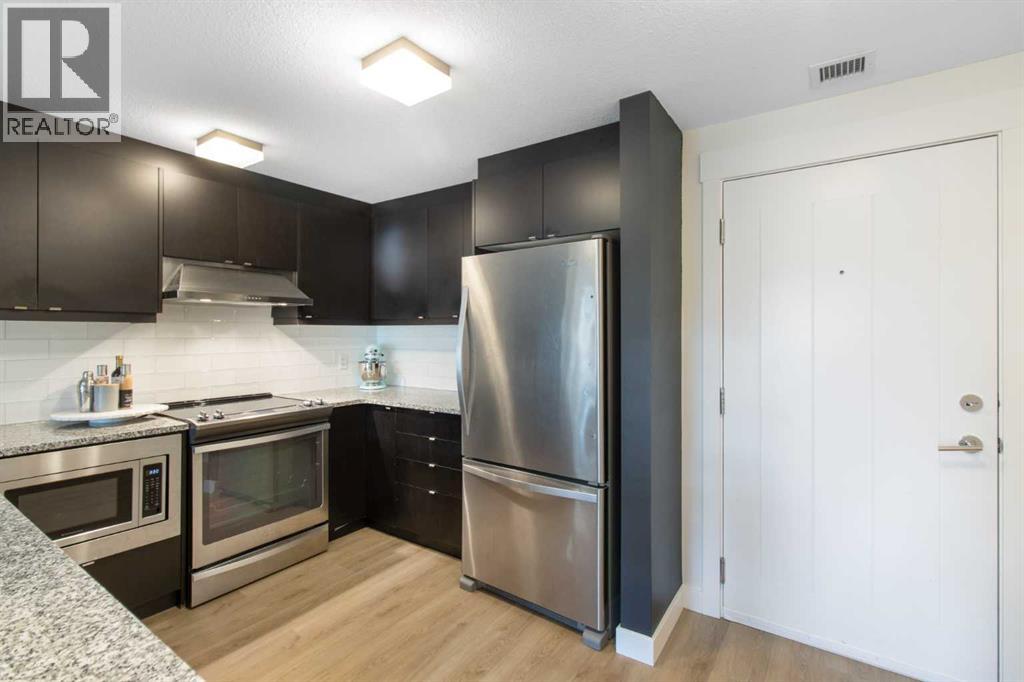 Photo 6 of 103 15 Aspenmont Heights Sw, Calgary AB