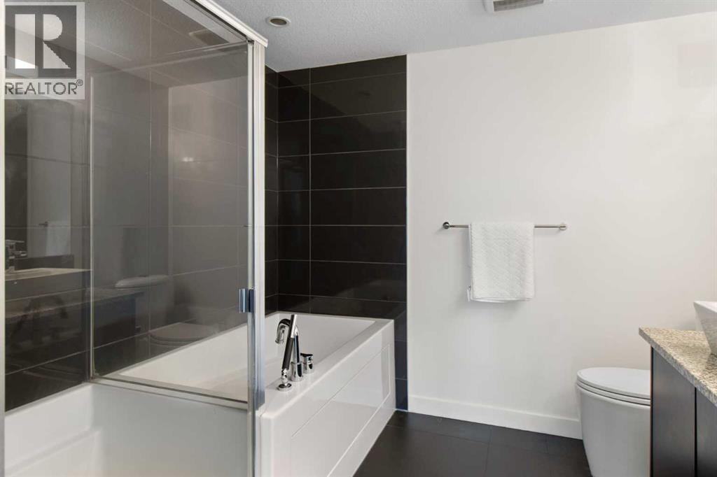 Photo 11 of 103 15 Aspenmont Heights Sw, Calgary AB