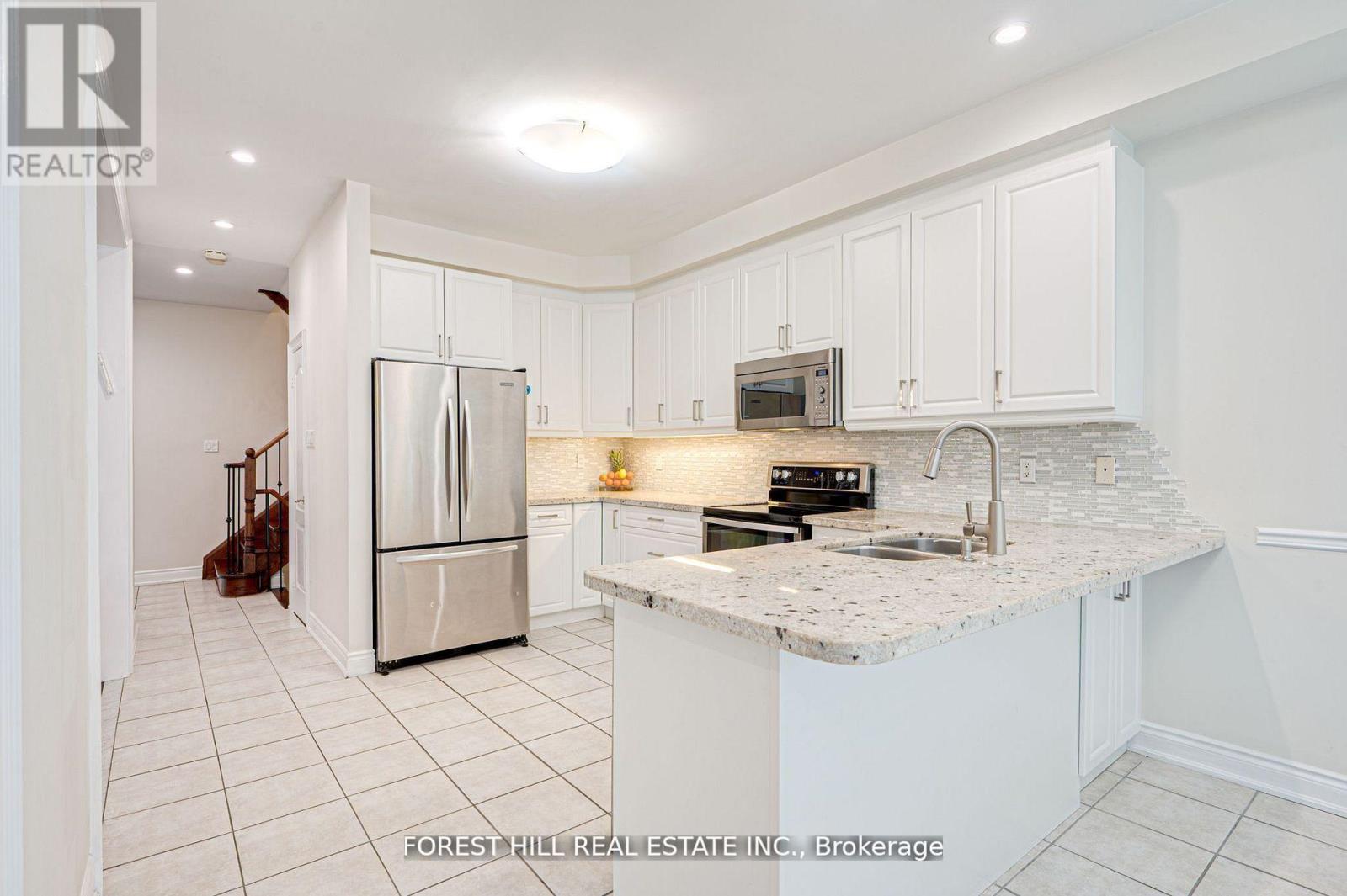 Photo 4 of 473 Apple Blossom Drive, Vaughan ON