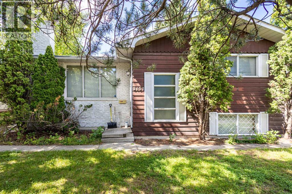 Photo 1 of 3151 Upper Place Nw, Calgary AB