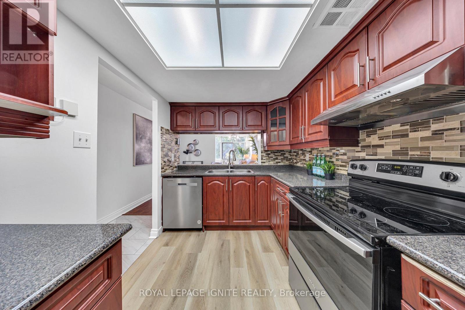 Photo 4 of 215 88 Alton Towers Circle, Toronto ON
