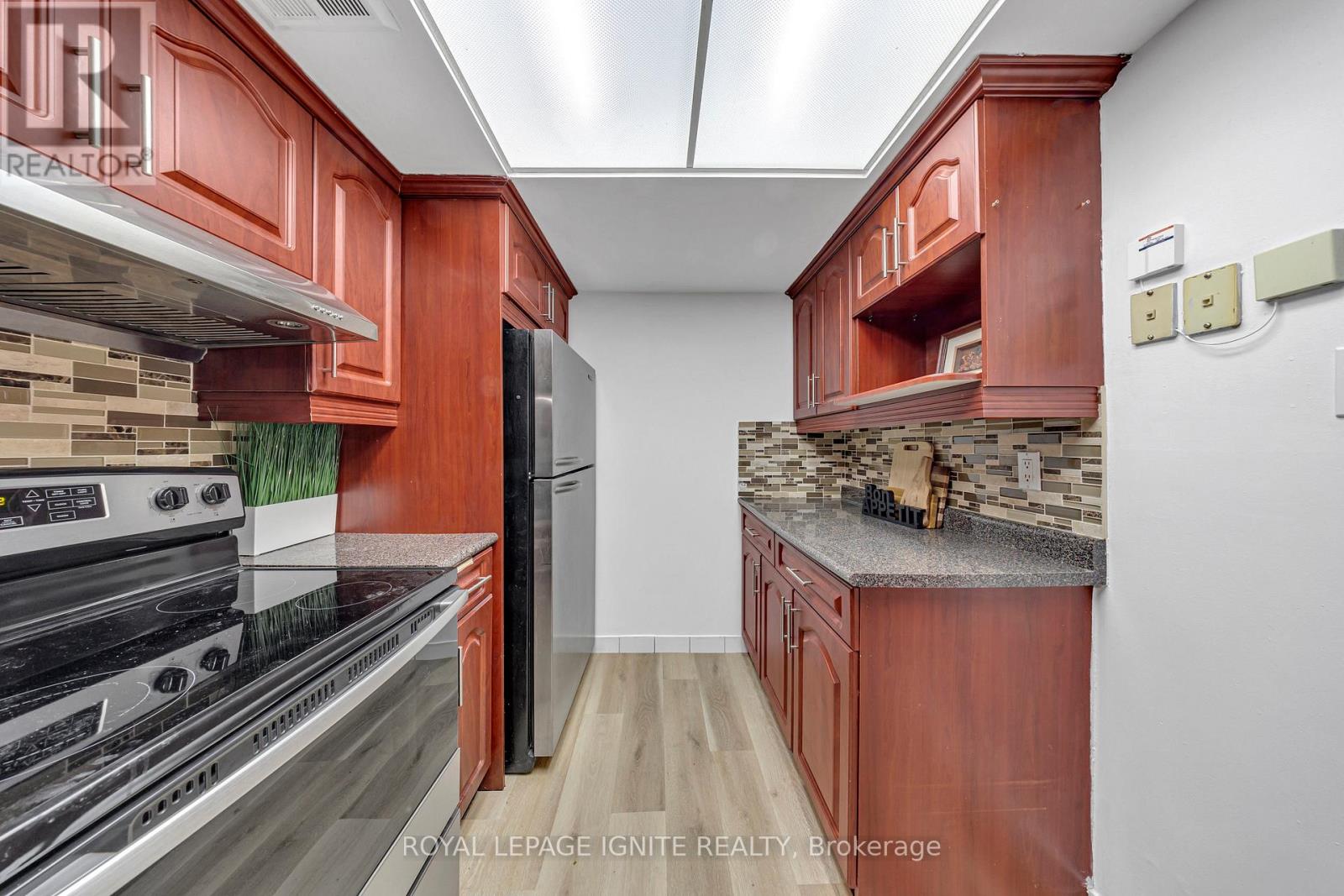 Photo 5 of 215 88 Alton Towers Circle, Toronto ON