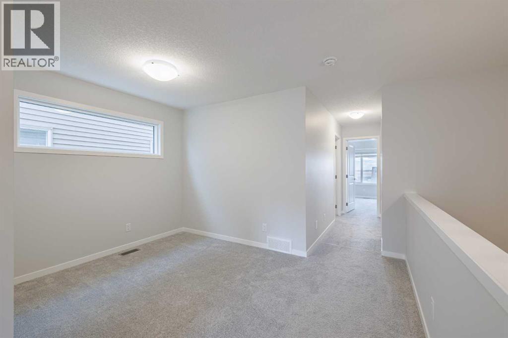 Photo 21 of 120 Edith Place Nw, Calgary AB