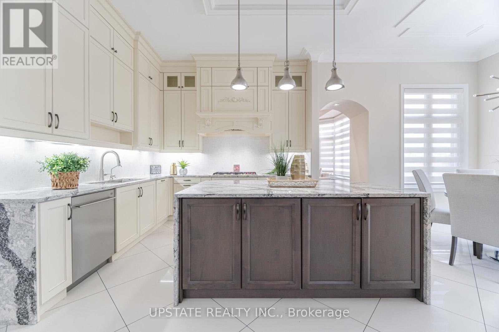 Photo 11 of 57 Elbern Markell Drive, Brampton ON