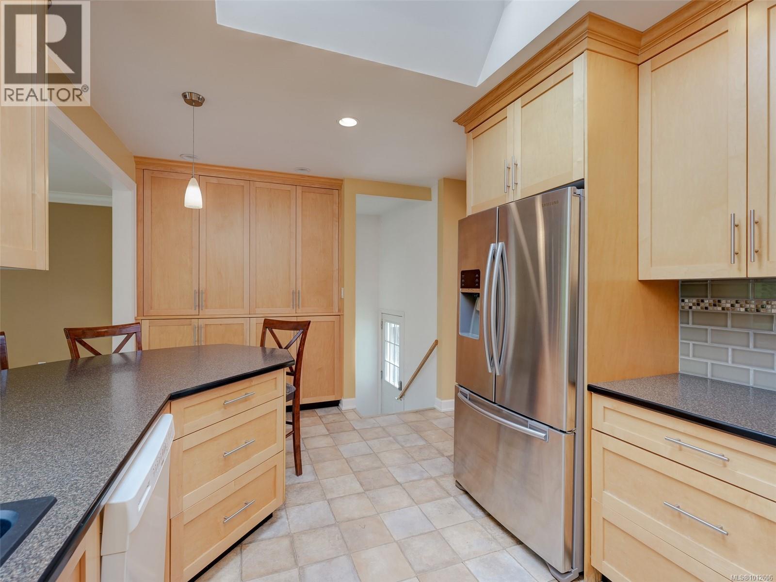 Photo 11 of 4406 Torquay Dr, Saanich BC