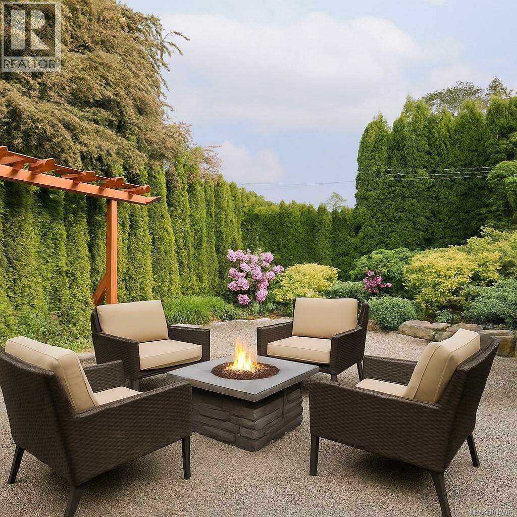 Photo 31 of 4406 Torquay Dr, Saanich BC